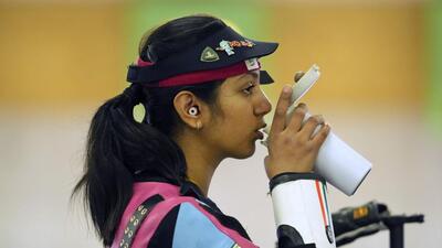 India's Ramita Jindal has a drink before the 10m air rifle women's qualification event. (AP) India's Ramita Jindal has a drink before the 10m air rifle women's qualification event. (AP)
