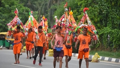 Kanwariyas carrying holy water collected from River Ganga in Haridwar going back to their hometown in Rajasthan state during the Kanwar Yatra at National Highway-48 near Signature Tower Chowk in Gurugram on Friday. (HT Photo) Kanwariyas carrying holy water collected from River Ganga in Haridwar going back to their hometown in Rajasthan state during the Kanwar Yatra at National Highway-48 near Signature Tower Chowk in Gurugram on Friday. (HT Photo)