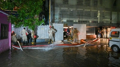 Officials from Fire Department pumps out the water from Rau' IAS study circle in old Rajendra Nagar where few students were allegedly drowned to death after the basement of the building was flooded following heavy rain in New Delhi, (Hindustan Times) Officials from Fire Department pumps out the water from Rau' IAS study circle in old Rajendra Nagar where few students were allegedly drowned to death after the basement of the building was flooded following heavy rain in New Delhi, (Hindustan Times)