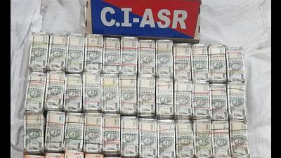 The cash that has been seized by the police in Amritsar. The cash that has been seized by the police in Amritsar.