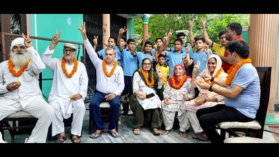 The family members of shooter Manu Bhakar celebrates as she won bronze medal in the Paris Olympics, in her native Goriya village in Jhajjar ditrict on Sunday. (Manoj Dhaka/HT) The family members of shooter Manu Bhakar celebrates as she won bronze medal in the Paris Olympics, in her native Goriya village in Jhajjar ditrict on Sunday. (Manoj Dhaka/HT)