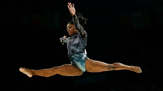 US' Simone Biles competes in the balance beam event of the artistic gymnastics women's qualification during the Paris 2024 Olympic Games(AFP) US' Simone Biles competes in the balance beam event of the artistic gymnastics women's qualification during the Paris 2024 Olympic Games(AFP)