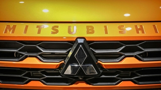 The emblem of Japanese automaker Mitsubishi Motor is seen at a showroom in Tokyo on May 9, 2024. (Yuichi YAMAZAKI / AFP)(AFP)