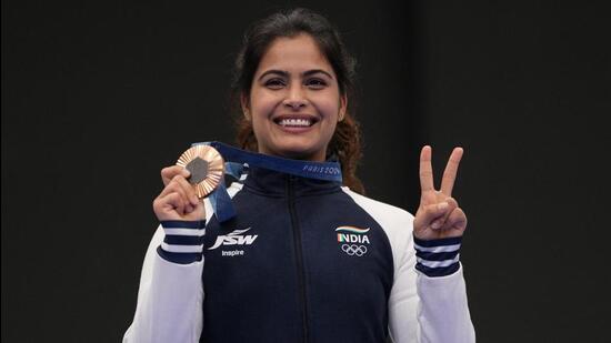 Manu Bhaker poses with the bronze medal at Chateauroux Shooting Centre on Sunday. (REUTERS)