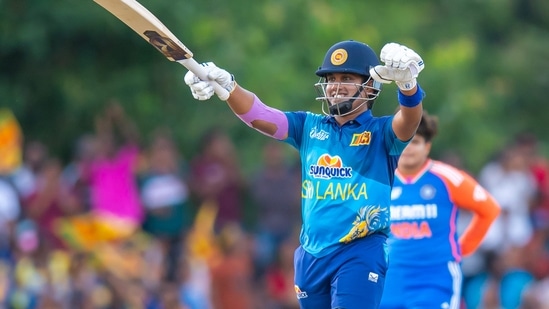 Sri Lanka's captain Chamari Athapaththu celebrates her half century during the Women's Asia Cup final T20 International cricket match between India and Sri Lanka, in Dambulla, Sunday