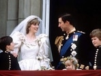 Prince Charles and Princess Diana stand on the balcony of Buckingham Palace in London, following their wedding at St. Pauls Cathedral, June 29, 1981. 