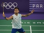 India's Lakshya Sen hits a shot against Guatemala's Kevin Cordon.