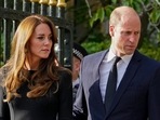 Britain's Prince William, second left, Kate, Princess of Wales, left, view the floral tributes for the late Queen Elizabeth II outside Windsor Castle, in Windsor, England on Sept. 10, 2022. Britain's Prince William, second left, Kate, Princess of Wales, left, view the floral tributes for the late Queen Elizabeth II outside Windsor Castle, in Windsor, England on Sept. 10, 2022.