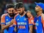 India's Hardik Pandya (C) celebrates with captain Suryakumar Yadav (R) and Mohammed Siraj after taking a wicket.(AFP) India's Hardik Pandya (C) celebrates with captain Suryakumar Yadav (R) and Mohammed Siraj after taking a wicket.(AFP)