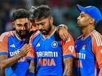 India's Hardik Pandya (C) celebrates with captain Suryakumar Yadav (R) and Mohammed Siraj after taking the wicket of Sri Lanka's Kusal Perera India's Hardik Pandya (C) celebrates with captain Suryakumar Yadav (R) and Mohammed Siraj after taking the wicket of Sri Lanka's Kusal Perera