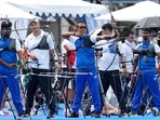 India's Dhiraj Bommadevara, left, Tarundeep Rai, center, and Pravin Ramesh Jadhav, right, compete during the men's archery