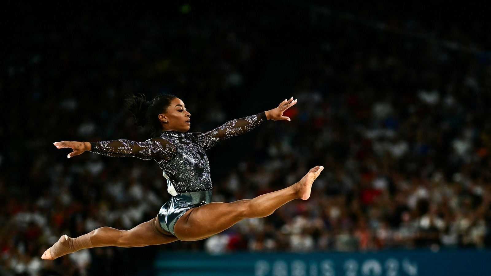 Simone Biles to Compete in All Four Events Despite Calf Injury