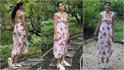 Shanaya Kapoor's stylish look radiates summer chic. It features a sweetheart neckline, corset bodice, and a flared bottom with a side slit. The red floral print on the white backdrop elevates her look to perfection. (Instagram) Shanaya Kapoor's stylish look radiates summer chic. It features a sweetheart neckline, corset bodice, and a flared bottom with a side slit. The red floral print on the white backdrop elevates her look to perfection. (Instagram)