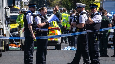 Police secure the area, where a man has been detained and a knife has been seized after a number of people were injured in a reported stabbing, in Southport, Merseyside, England, Monday July 29, 2024. (AP) Police secure the area, where a man has been detained and a knife has been seized after a number of people were injured in a reported stabbing, in Southport, Merseyside, England, Monday July 29, 2024. (AP)