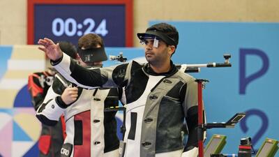 India's Arjun Babuta gestures after finishing fourth in the 10m air rifle men's final at the Paris Olympics on Monday. (AP) India's Arjun Babuta gestures after finishing fourth in the 10m air rifle men's final at the Paris Olympics on Monday. (AP)