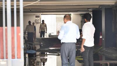 Officials probe the ground floor and the passageway to the basement of the Rau Study Circle building in Rajendra Nagar. (Arvind Yadav/HT Photo) Officials probe the ground floor and the passageway to the basement of the Rau Study Circle building in Rajendra Nagar. (Arvind Yadav/HT Photo)