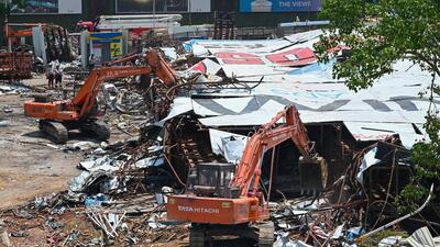 On May 13, the oversized hoarding collapsed on an adjoining petrol pump, killing 17 persons and injuring over 70. Following an uproar, the government announced the judicial probe on June 10. However, there was immense delay in deciding the terms of reference or the scope of the inquiry by the committee. (Raju Shinde/HT Photo) On May 13, the oversized hoarding collapsed on an adjoining petrol pump, killing 17 persons and injuring over 70. Following an uproar, the government announced the judicial probe on June 10. However, there was immense delay in deciding the terms of reference or the scope of the inquiry by the committee. (Raju Shinde/HT Photo)