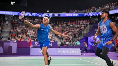 Paris: India's Satwiksairaj Rankireddy and Chirag Shetty play against France's Lucas Corvee and Ronan Labar during their men's doubles badminton group stage match at Porte de la Chapelle Arena during the 2024 Summer Olympics (PTI) Paris: India's Satwiksairaj Rankireddy and Chirag Shetty play against France's Lucas Corvee and Ronan Labar during their men's doubles badminton group stage match at Porte de la Chapelle Arena during the 2024 Summer Olympics (PTI)