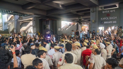 Students protest outside Karol Bagh metro station after 3 UPSC aspirants drown in the flooded basement of Rau's IAS institute at Old Rajinder Nagar area, in New Delhi, Sunday, July 28, 2024. (PTI) Students protest outside Karol Bagh metro station after 3 UPSC aspirants drown in the flooded basement of Rau's IAS institute at Old Rajinder Nagar area, in New Delhi, Sunday, July 28, 2024. (PTI)