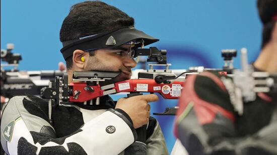India's Arjun Babuta competes in the 10m air rifle men's final at the 2024 Summer Olympics, on Monday. (AP) India's Arjun Babuta competes in the 10m air rifle men's final at the 2024 Summer Olympics, on Monday. (AP)