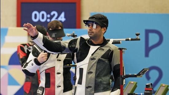 India's Arjun Babuta gestures after finishing fourth in the 10m air rifle men's final at the Paris Olympics on Monday. (AP)