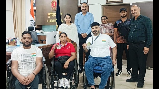 Ludhiana deputy commissioner Sakshi Sawhney lauded Shubham Wadhwa, a para table tennis international player, and Shabnam, a para badminton player, for their outstanding achievements in the game and for bringing laurels to the country and state (HT Photo)