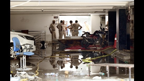 New Delhi, India - July 29, 2024: Delhi Police officers and MCD officials investigates Rau's IAS Study circle Spot at Old Rajinder Nagar area, after three civil services aspirants died at a coaching centre due to drowning, in in New Delhi, India, on Monday, July 29, 2024. (Photo by Arvind Yadav/ Hindustan Times) (Hindustan Times)