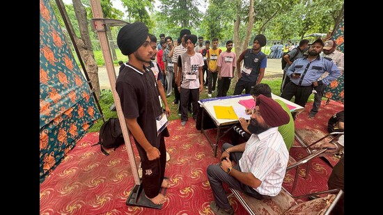 Officials checking the height and weight of the players before the Khelo India Rising Talent Identification assessment trials at Multipurpose Stadium in Ludhiana on Monday. (Gurpreet Singh/HT)