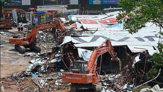 On May 13, the oversized hoarding collapsed on an adjoining petrol pump, killing 17 persons and injuring over 70. Following an uproar, the government announced the judicial probe on June 10. However, there was immense delay in deciding the terms of reference or the scope of the inquiry by the committee. (Raju Shinde/HT Photo) On May 13, the oversized hoarding collapsed on an adjoining petrol pump, killing 17 persons and injuring over 70. Following an uproar, the government announced the judicial probe on June 10. However, there was immense delay in deciding the terms of reference or the scope of the inquiry by the committee. (Raju Shinde/HT Photo)