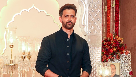 Hrithik Roshan poses for photographs as he arrives to attend Anant Ambani and Radhika Merchant's wedding in Mumbai on July 12, 2024. (File Photo/PTI)