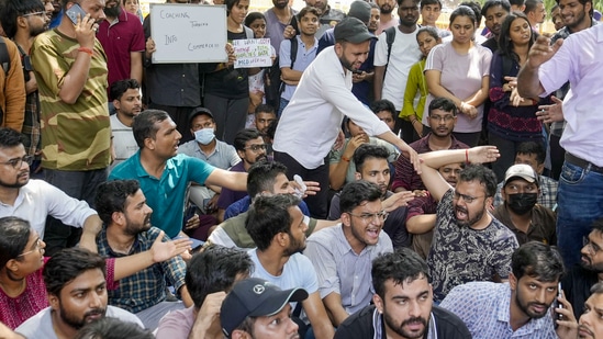 Students stage a protest after three civil services aspirants died due to drowning at a coaching centre in Old Rajinder Nagar area in New Delhi (PTI Photo/Shahbaz Khan)(PTI)