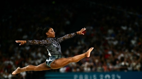US' Simone Biles competes in the floor exercise event of the artistic gymnastics women's qualification during the Paris 2024 Olympic Games (AFP)