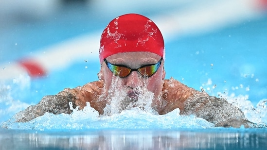 Britain's Adam Peaty competes in the final of the men's 100m breaststroke swimming event during the Paris 2024 Olympic Games (AFP)