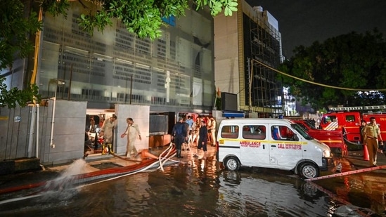 The flooded road outside Rau's IAS coaching centre in Rajendra Nagar on Sunday. (Sanchit Khanna/HT Photo)