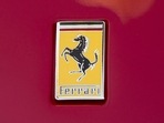 A Ferrari logo is seen on a Ferrari outside the New York Stock Exchange.