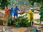 Relief personnel carry the body of a victim, during a search and rescue operation at a site following landslides in Wayanad on July 30, 2024. (Photo by R. J. Mathew / AFP)(AFP) Relief personnel carry the body of a victim, during a search and rescue operation at a site following landslides in Wayanad on July 30, 2024. (Photo by R. J. Mathew / AFP)(AFP)