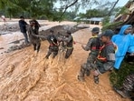 This photograph provided by PRO Defense Kochi shows Indian army soldiers engaged in rescue operations at landslide affected village in Wayanad. This photograph provided by PRO Defense Kochi shows Indian army soldiers engaged in rescue operations at landslide affected village in Wayanad.