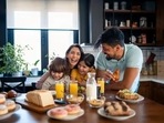 Having a slow morning with loved ones, having light conversations with them over breakfast and laughing out with them helps in feeling lighter and happier for the rest of the day.(Unsplash)