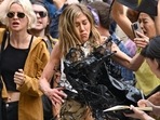 Jennifer Aniston gets oil splashed at her during The Morning Show shoot