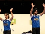 India's Manu Bhaker (left) and Sarabjot Singh (right) celebrate after winning the bronze medal in the 10m air pistol mixed team event at the 2024 Summer Olympics, Tuesday.(AP) India's Manu Bhaker (left) and Sarabjot Singh (right) celebrate after winning the bronze medal in the 10m air pistol mixed team event at the 2024 Summer Olympics, Tuesday.(AP)