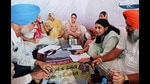 MLA Manwinder Singh Giaspura and deputy commissioner Sakshi Sawhney interacting with a villager during Sarkar Tuhade Dwar camp in Siarh, Ludhiana, on Tuesday. (HT Photo) MLA Manwinder Singh Giaspura and deputy commissioner Sakshi Sawhney interacting with a villager during Sarkar Tuhade Dwar camp in Siarh, Ludhiana, on Tuesday. (HT Photo)