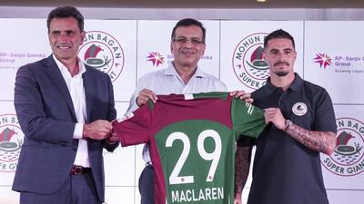 (From left) Mohun Bagan head coach Jose Molina at his and player Jamie Maclaren’s presentation, with owner Sanjiv Goenka (C) in Kolkata on Tuesday. (PTI) (From left) Mohun Bagan head coach Jose Molina at his and player Jamie Maclaren’s presentation, with owner Sanjiv Goenka (C) in Kolkata on Tuesday. (PTI)