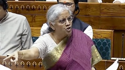 Union Minister of Finance and Corporate Affairs Nirmala Sitharaman speaks in the Lok Sabha during the Monsoon Session of Parliament, in New Delhi on Tuesday. (ANI Photo/SansadTV) (SansadTV) Union Minister of Finance and Corporate Affairs Nirmala Sitharaman speaks in the Lok Sabha during the Monsoon Session of Parliament, in New Delhi on Tuesday. (ANI Photo/SansadTV) (SansadTV)