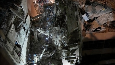 An Israeli airstrike hit Hezbollah's stronghold south of Beirut, killing a military commander accused of orchestrating the 1983 beirut marine bombing (AP Photo/Hussein Malla) (AP) An Israeli airstrike hit Hezbollah's stronghold south of Beirut, killing a military commander accused of orchestrating the 1983 beirut marine bombing (AP Photo/Hussein Malla) (AP)