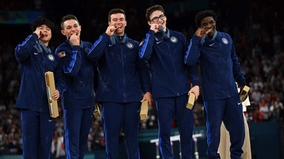 Team USA poses with their bronze medal during the podium ceremony for the artistic gymnastics men's team final during the Paris 2024 Olympic Games. (AFP) Team USA poses with their bronze medal during the podium ceremony for the artistic gymnastics men's team final during the Paris 2024 Olympic Games. (AFP)