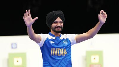 India’s Sarabjot Singh celebrates after winning the Olympic 10m air pistol mixed team bronze medal partnering Manu Bhaker at the Chateauroux Shooting Centre on Tuesday. (REUTERS) India’s Sarabjot Singh celebrates after winning the Olympic 10m air pistol mixed team bronze medal partnering Manu Bhaker at the Chateauroux Shooting Centre on Tuesday. (REUTERS)