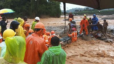 NDRF personnel conduct rescue operation in Wayanad district of Kerala on Tuesday. (PTI Photo) NDRF personnel conduct rescue operation in Wayanad district of Kerala on Tuesday. (PTI Photo)