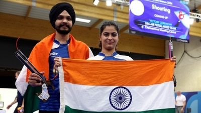 Bronze medalists India's Manu Bhaker and India's Sarabjot Singh pose at the end of the shooting 10m air pistol mixed team event during the Paris 2024 Olympic Games (AFP) Bronze medalists India's Manu Bhaker and India's Sarabjot Singh pose at the end of the shooting 10m air pistol mixed team event during the Paris 2024 Olympic Games (AFP)