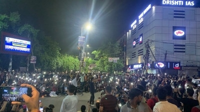 Students protest outsdie Drishti IAS coaching centre in North West Delhi's Mukherjee Nagar on Monday evening. (@AddarshK/X) Students protest outsdie Drishti IAS coaching centre in North West Delhi's Mukherjee Nagar on Monday evening. (@AddarshK/X)