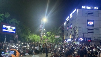 Students protest outsdie Drishti IAS coaching centre in North West Delhi's Mukherjee Nagar on Monday evening. (@AddarshK/X) Students protest outsdie Drishti IAS coaching centre in North West Delhi's Mukherjee Nagar on Monday evening. (@AddarshK/X)
